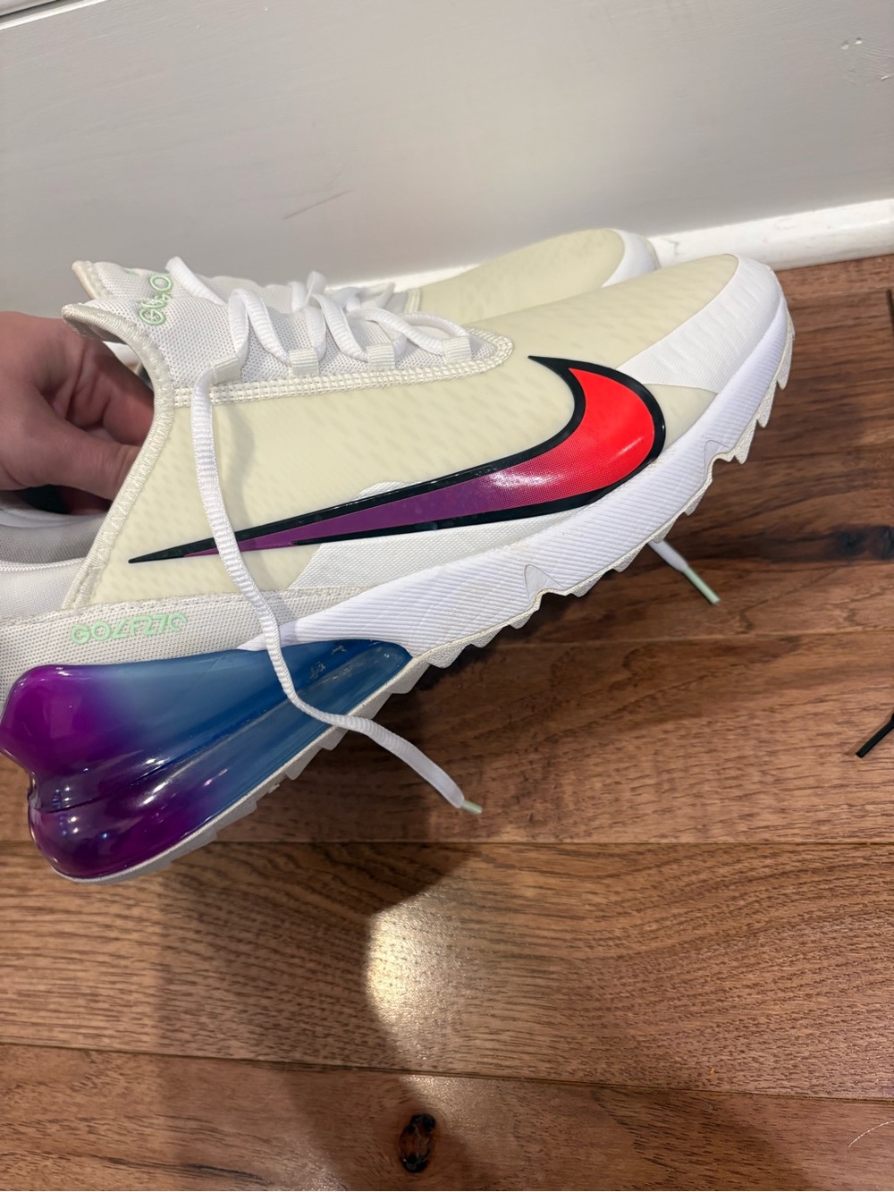 Nike White/Cream Trainer with Red‑to‑Purple Gradient Swoosh